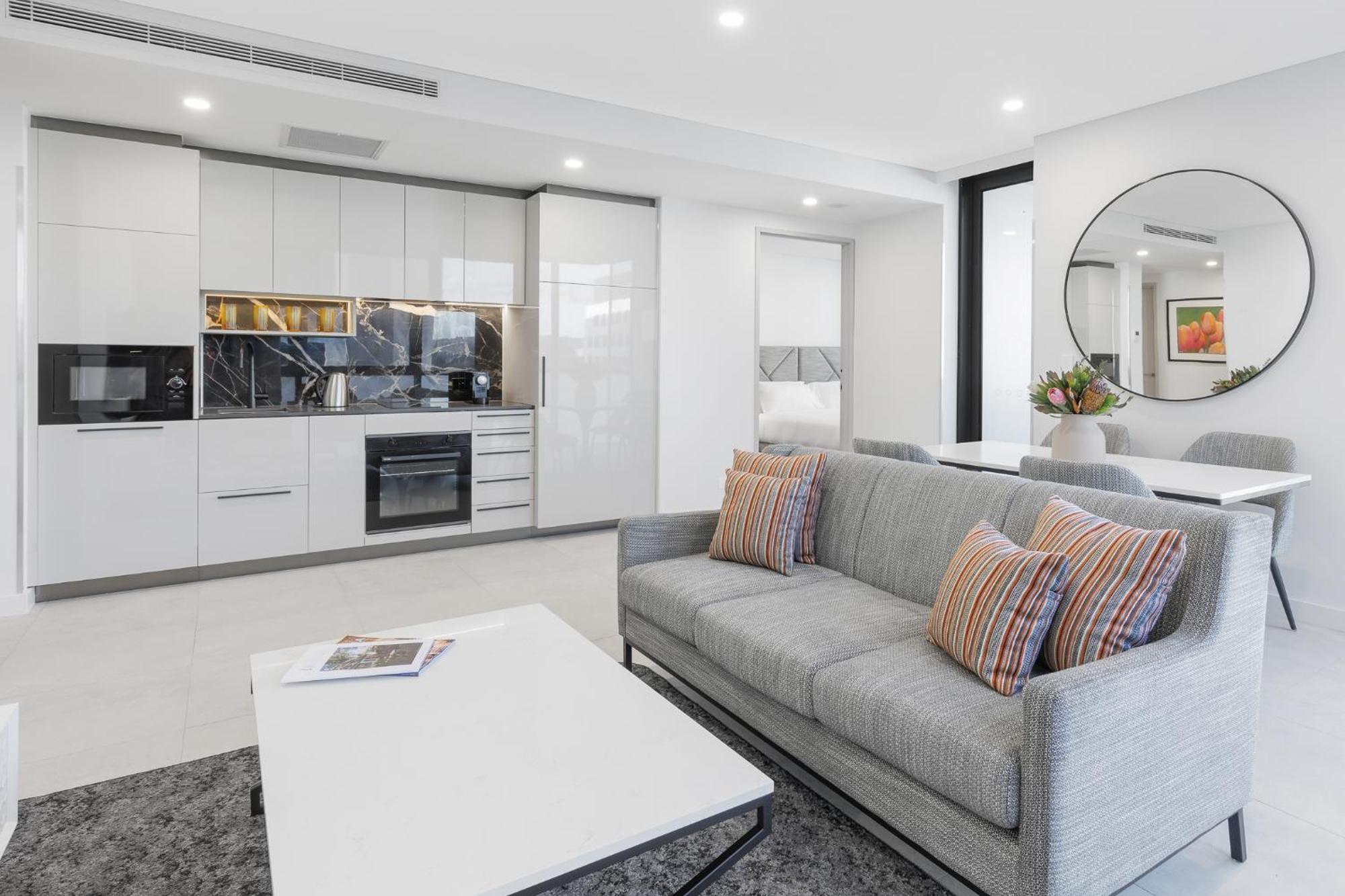 Meriton Suites Canberra Kültér fotó A typical apartment interior