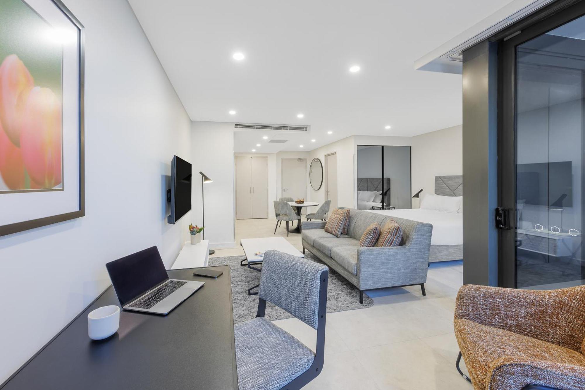Meriton Suites Canberra Kültér fotó A typical apartment interior
