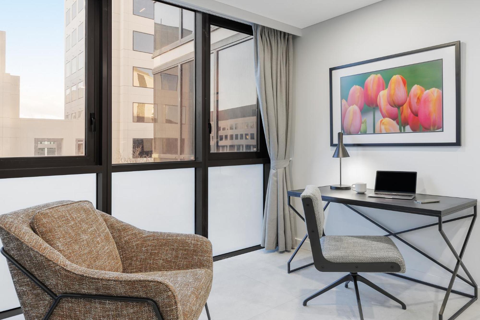 Meriton Suites Canberra Kültér fotó A typical apartment at The Met