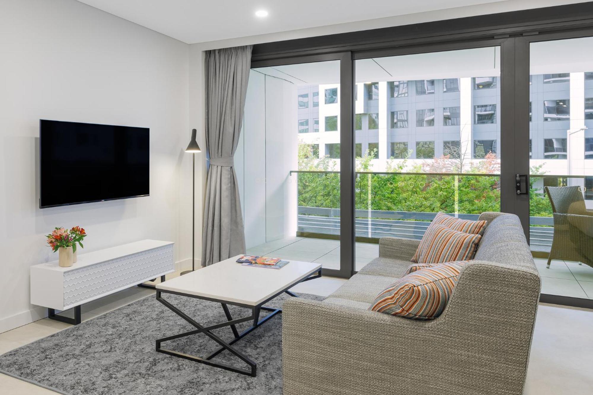 Meriton Suites Canberra Kültér fotó Living room